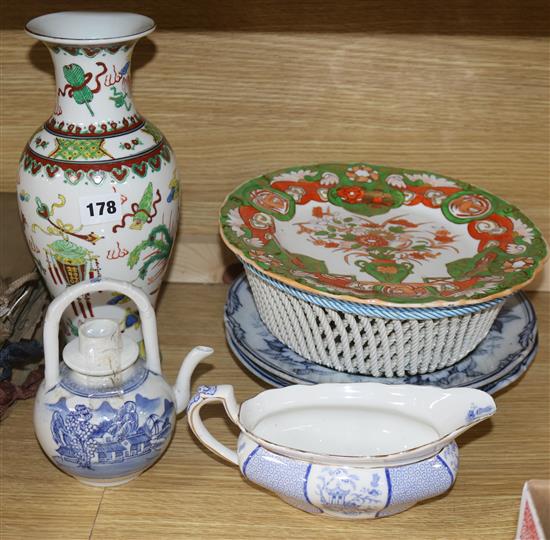 A Chinese teapot, a vase, ironstone plates, etc.